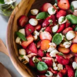 Strawberry Caprese Salad Plated with Fresh Basil